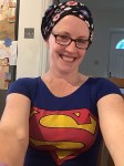 Woman with headscarf wearing Superman T-shirt